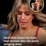 Heidi Klum leaves Hot Ones host stunned after she starts stripping down